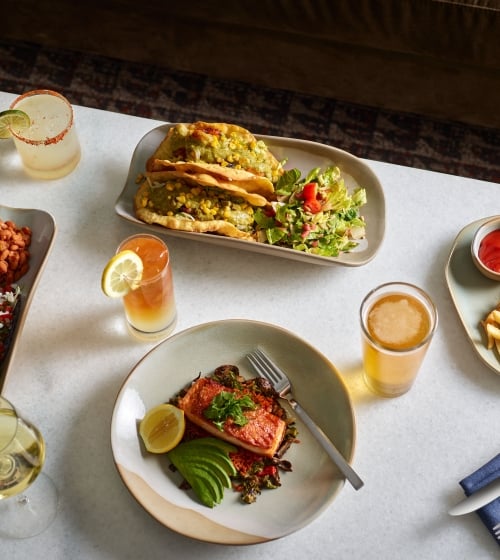 A spread of main dishes at Yellowbell