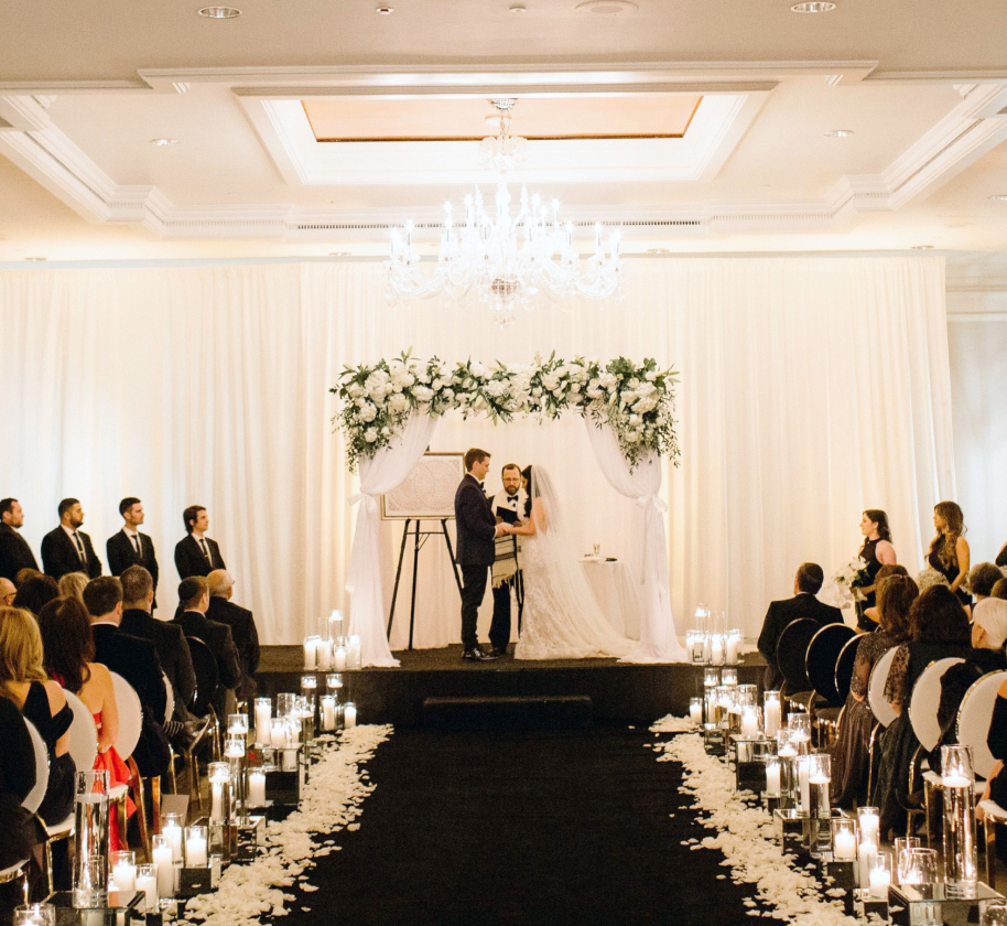 A bride and groom at the alter at the Camby