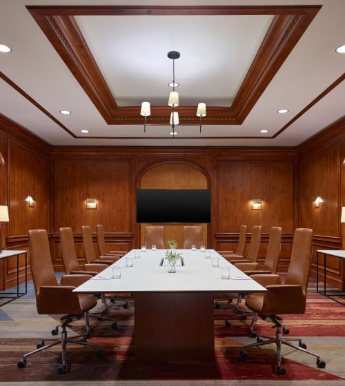 A large boardroom at the Camby with one large table setup for a meeting