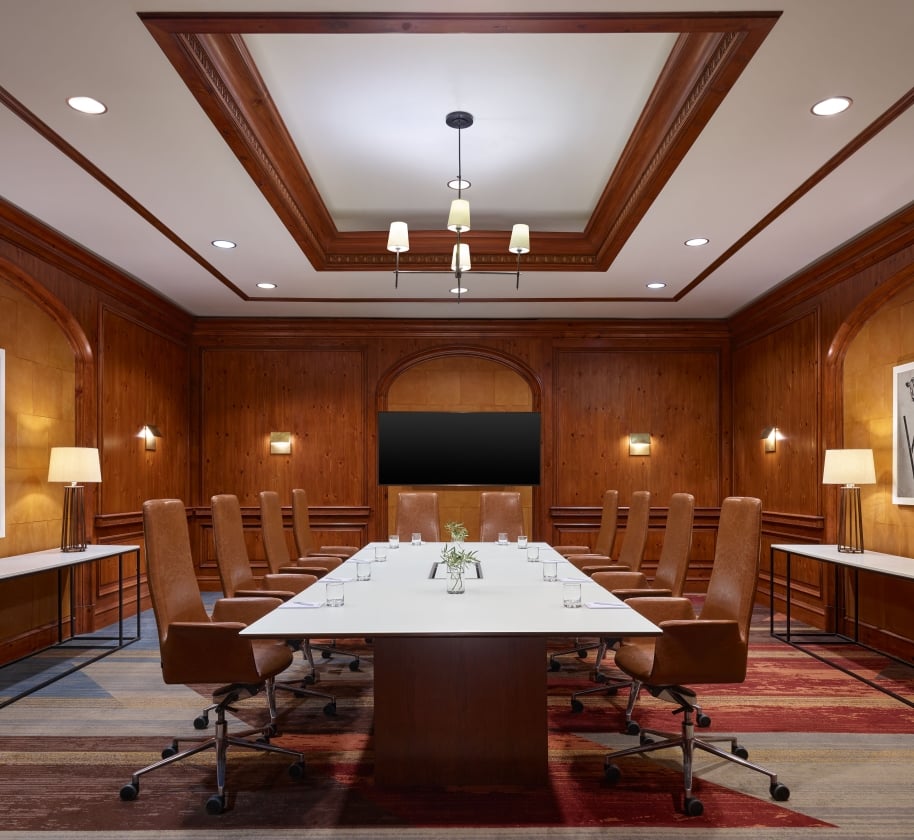 A large boardroom at the Camby with one large table setup for a meeting