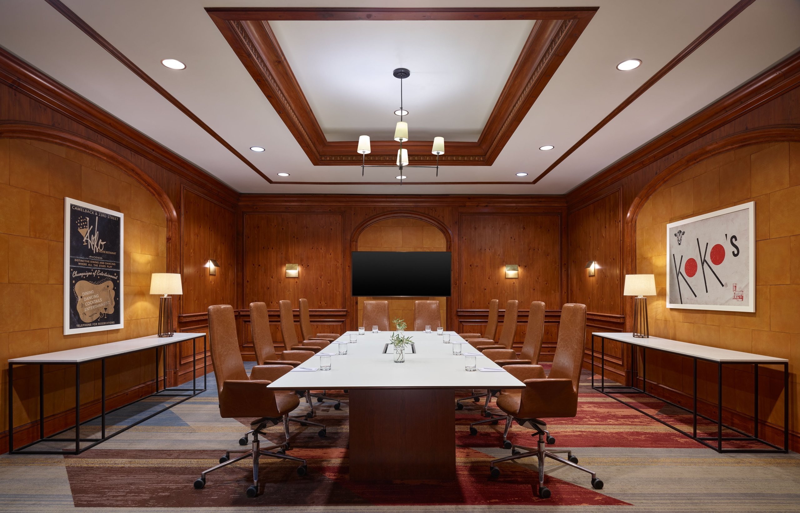 A large boardroom at the Camby with one large table setup for a meeting