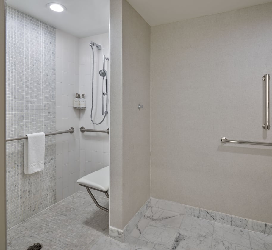 The shower area inside an ADA room at the Camby