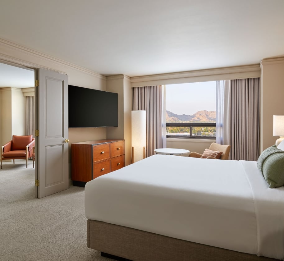 Bedroom and Living area of the Uptown Suite at the Camby