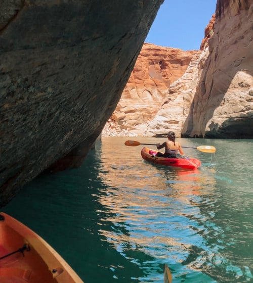 A woma paddle boarding in Phoenix