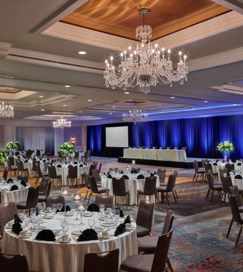 Camby ballroom with tables setup for a function