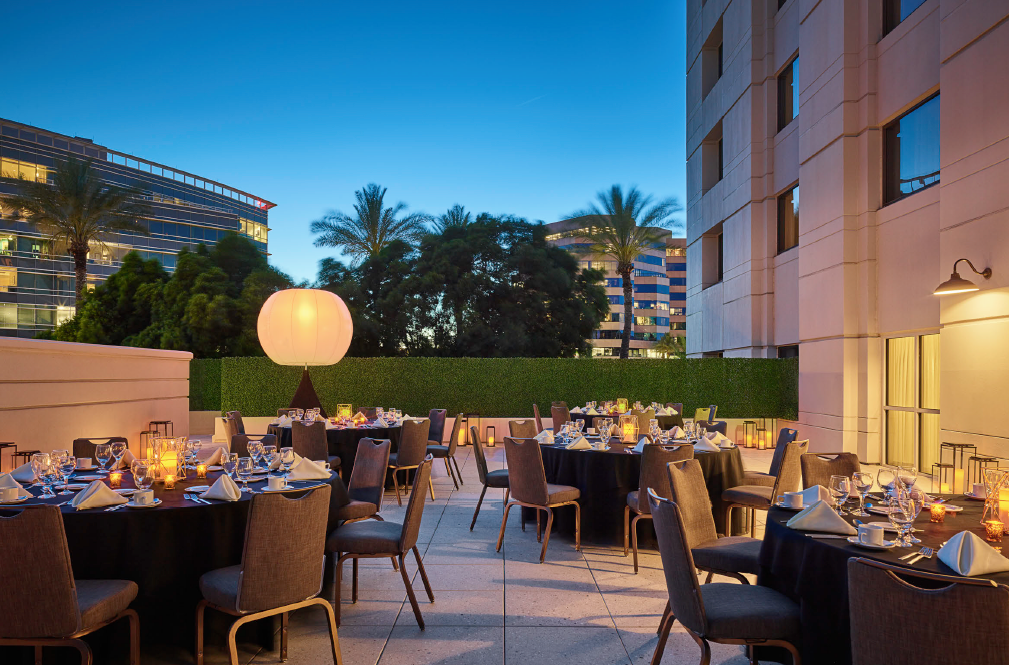 The Grove patio at sunset at the Camby