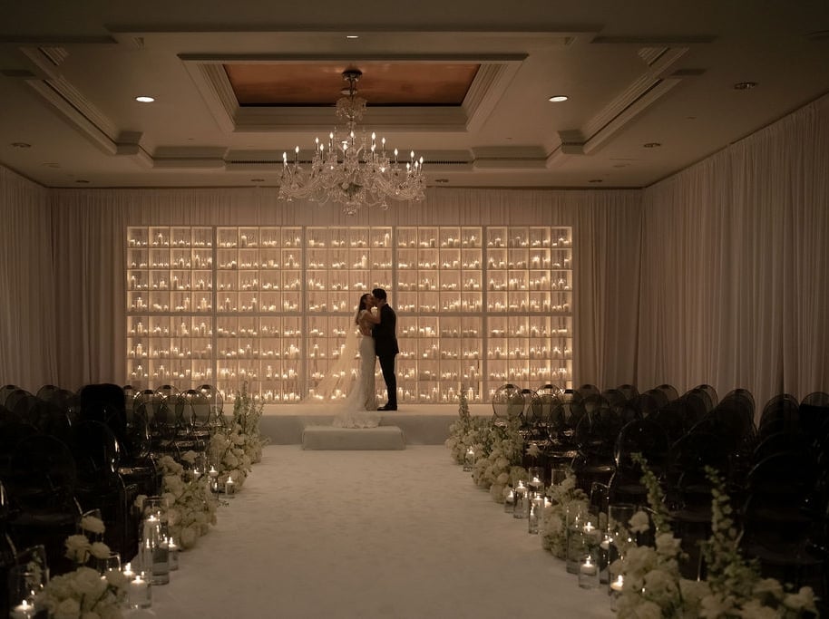 A bride and groom at the alter in a Camby venue